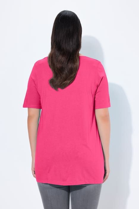 T-shirt en modal. Plis fantaisie, col rond et manches courtes. Coupe évasée