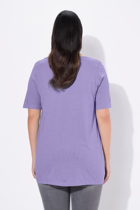 T-shirt en modal. Plis fantaisie, col rond et manches courtes. Coupe évasée