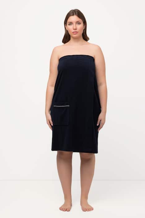 Robe sortie de bain en éponge. Fermeture velcro. Bande élastique dans le dos