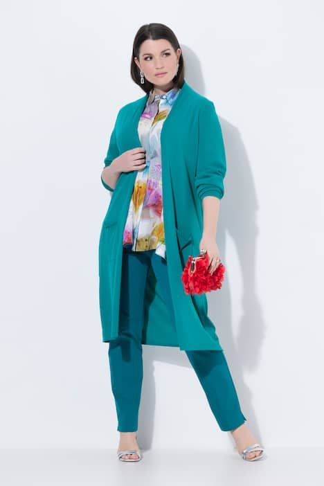 Cardigan long à col montant. Coupe ouverte