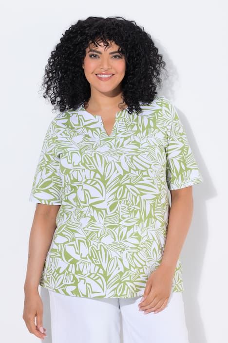 T-shirt, motif feuilles. Manches courtes et col tunisien. Coupe évasée