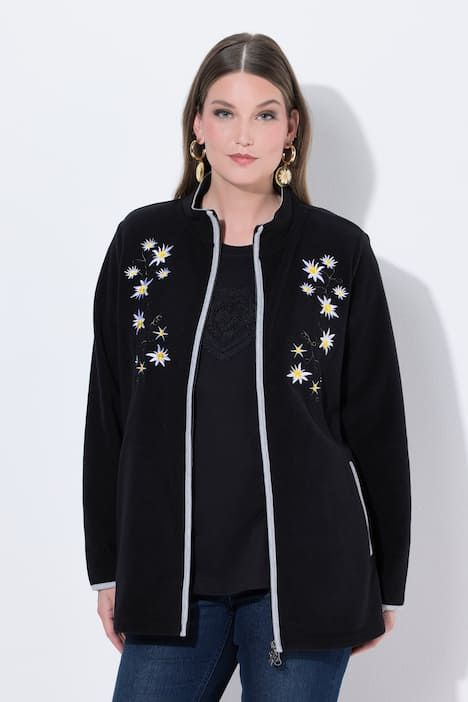 Veste en polaire esprit costume traditionnel bavarois. Fermeture zippée à double sens. Broderies edelweiss