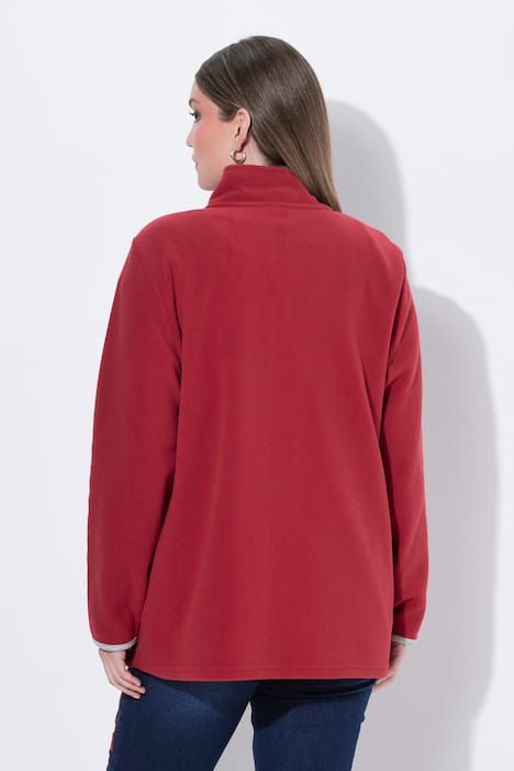 Veste en polaire esprit costume traditionnel bavarois. Fermeture zippée à double sens. Broderies edelweiss