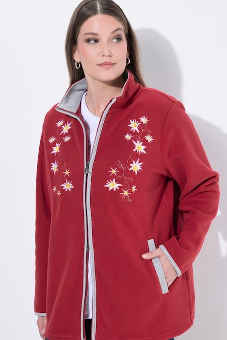 Veste en polaire esprit costume traditionnel bavarois. Fermeture zippée à double sens. Broderies edelweiss