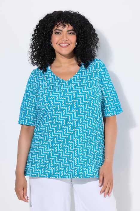 T-shirt à imprimé graphique. Col en V et manches courtes. Coupe évasée