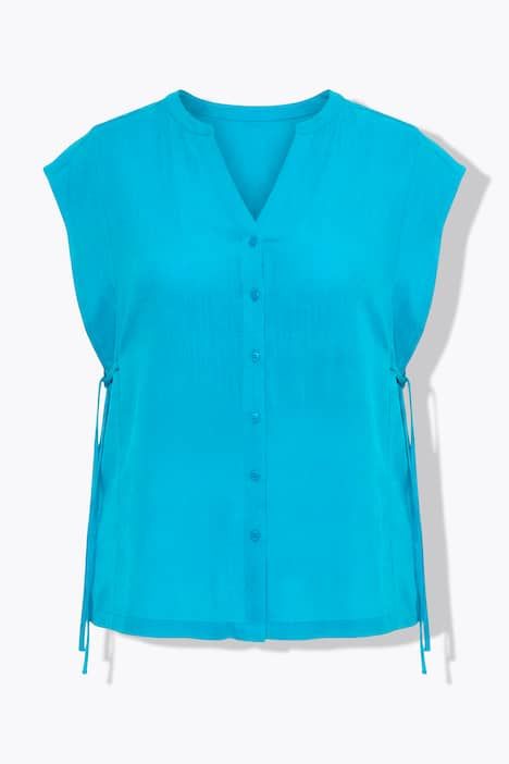 Blouse oversize, col tunisien et manches courtes, cordons pour ajuster la silhouette