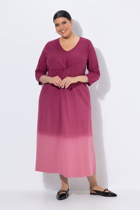 Robe en jersey motif batik, décolleté en V et manches 3/4, coupe évasée