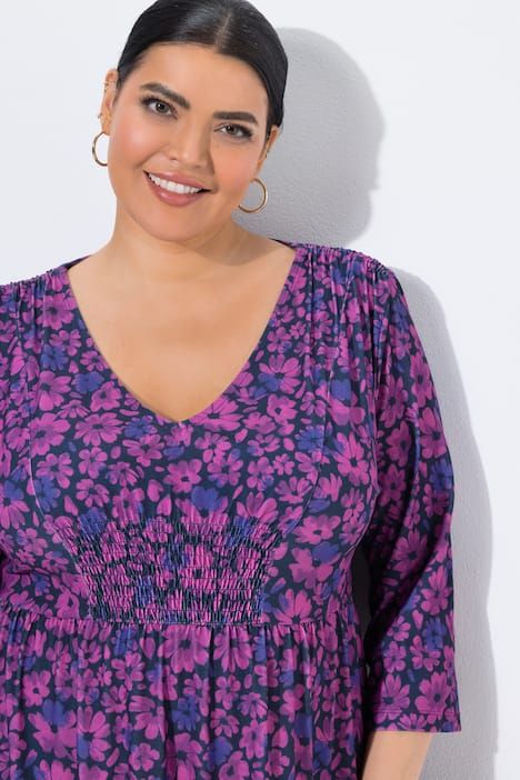 Robe en jersey à fleurs, décolleté en V et manches 3/4, coupe évasée