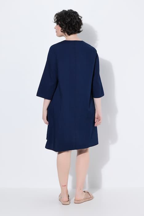 Robe en jersey avec poches et manches 3/4, décolleté en V avec pli fantaisie