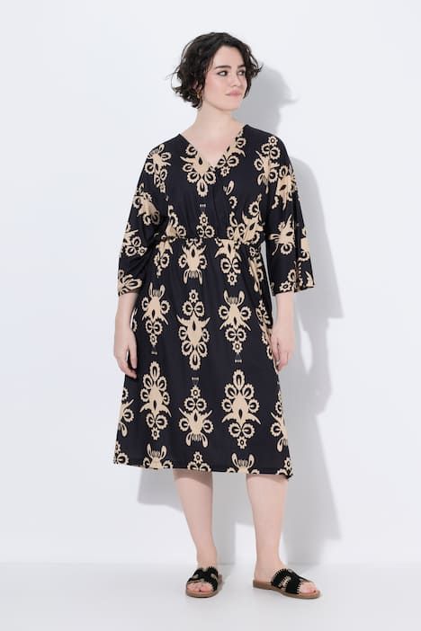 Robe imprimée, décolleté en V effet cache-cœur et manches 3/4