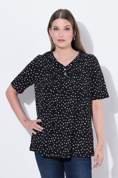 T-shirt avec passepoils, décolleté en V et manches courtes, coupe évasée