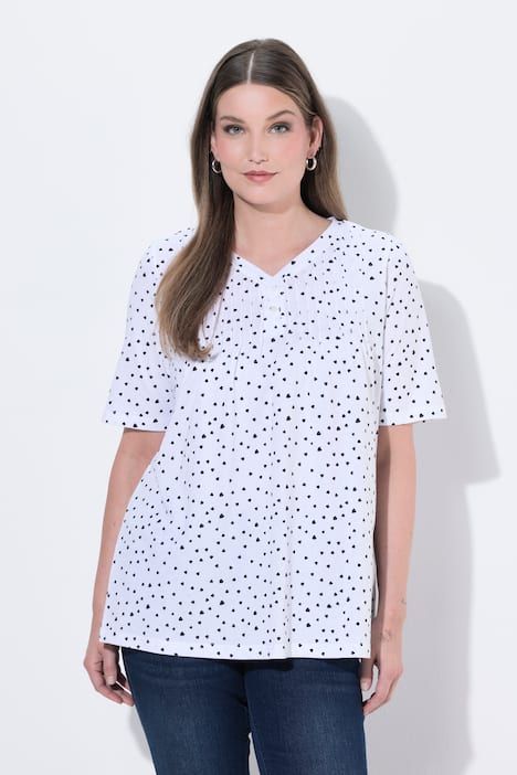 T-shirt avec passepoils, décolleté en V et manches courtes, coupe évasée