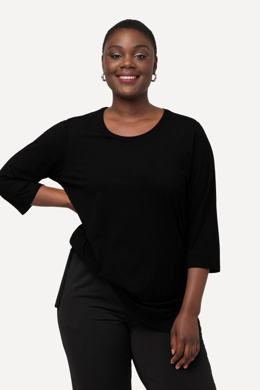 T-shirt à coupe allongée, manches 3/4. Collection selection