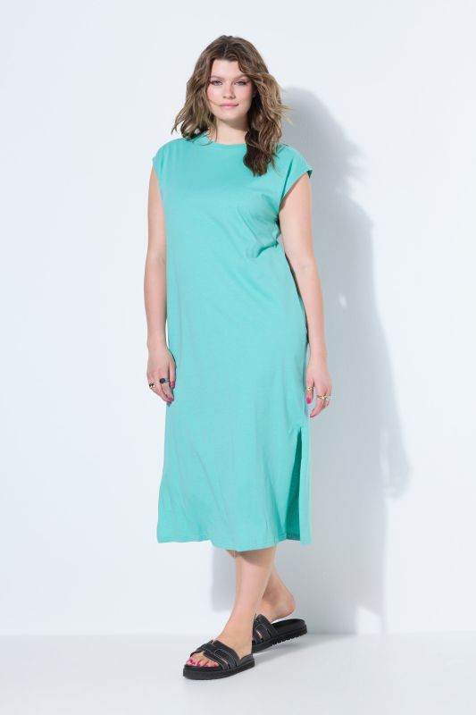 Robe midi en jersey oversized à encolure ronde et sans manches. Ouverture de type fente sur le côté