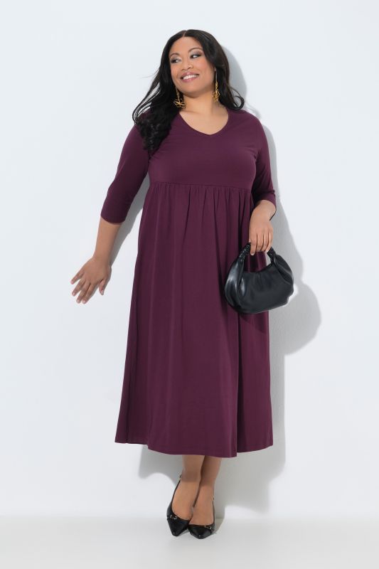 Robe en jersey avec poches, couture empire, décolleté en V et manches 3/4