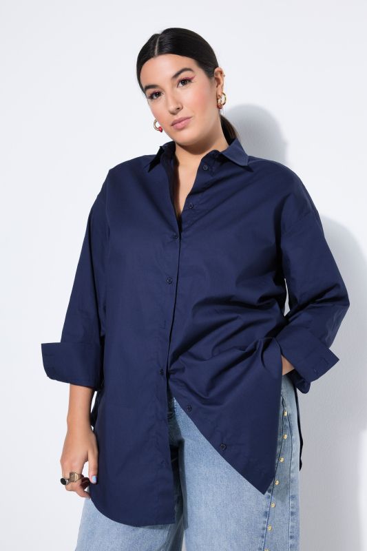 Bouse oversized à manches longues. Patte de boutonnage au dos