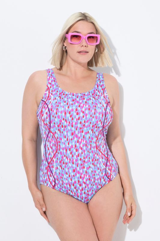 Maillot de bain à pois. Sans bonnets souples. Passepoils fantaisie. Décolleté rond