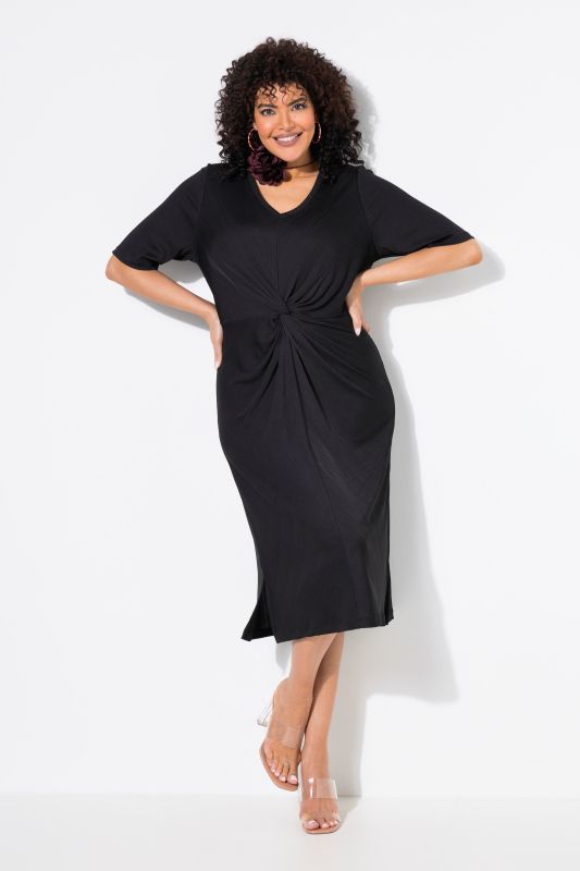 Robe en jersey, effet drapé. Décolleté V et manches courtes