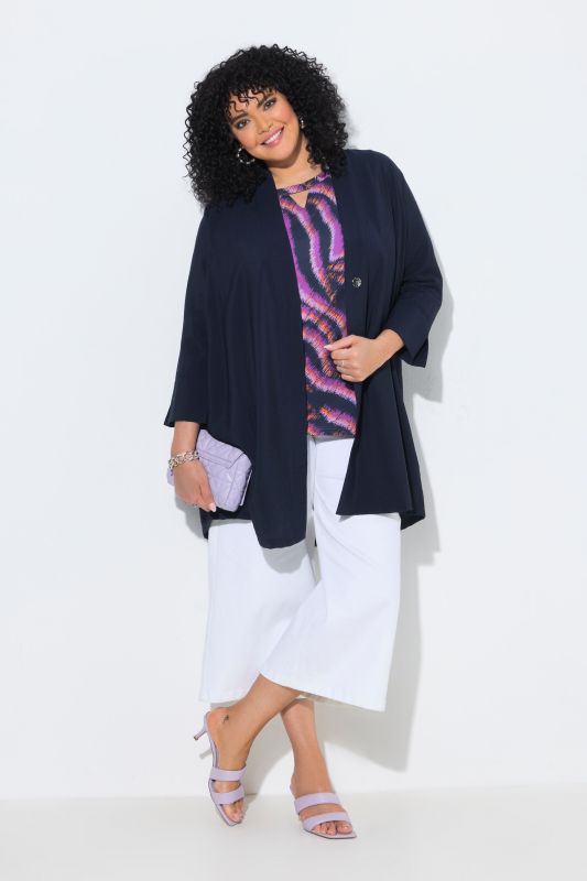 Veste à bouton-pression. Décolleté V et manches 7/8