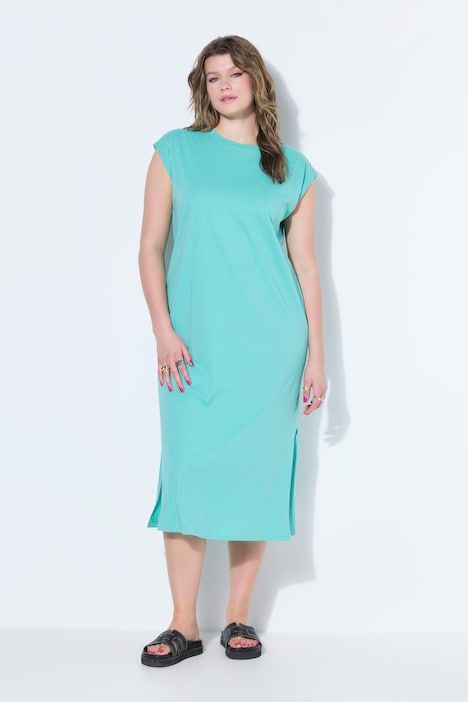 Robe midi en jersey oversized à encolure ronde et sans manches. Ouverture de type fente sur le côté