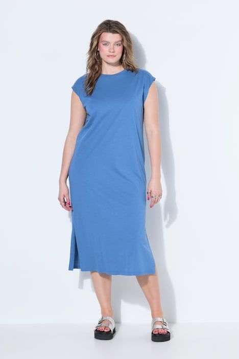 Robe midi en jersey oversized à encolure ronde et sans manches. Ouverture de type fente sur le côté