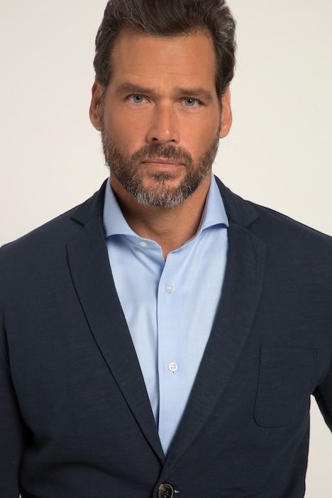 Veston en molleton flammé. Col à revers et poches plaquées