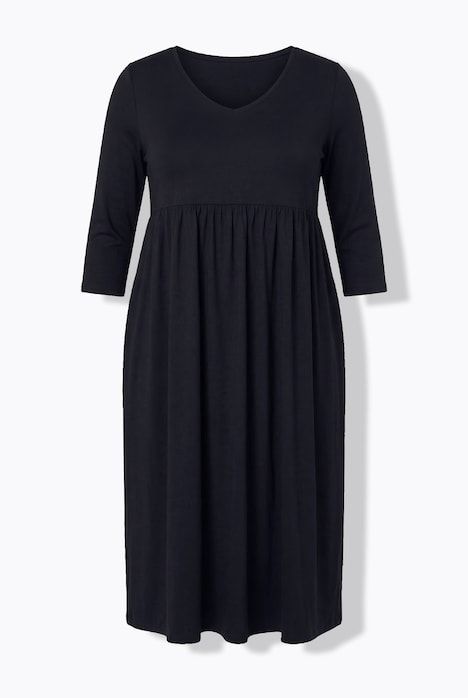 Robe en jersey avec poches, couture empire, décolleté en V et manches 3/4