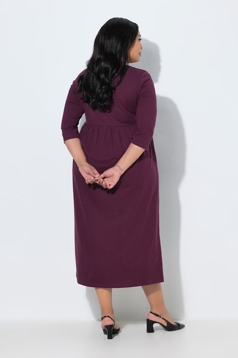 Robe en jersey avec poches, couture empire, décolleté en V et manches 3/4