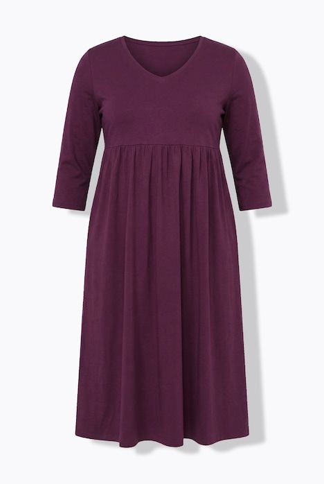 Robe en jersey avec poches, couture empire, décolleté en V et manches 3/4