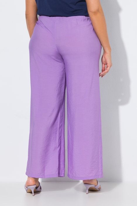 Pantalon à enfiler à tissu texturé. Taille élastique et jambe large