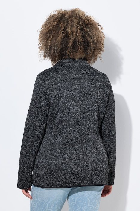 Veste en maille polaire, motif chiné, col montant et poches zippées