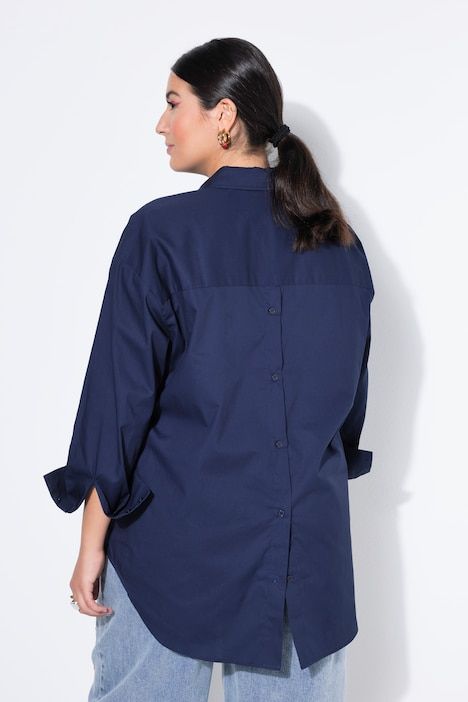 Bouse oversized à manches longues. Patte de boutonnage au dos