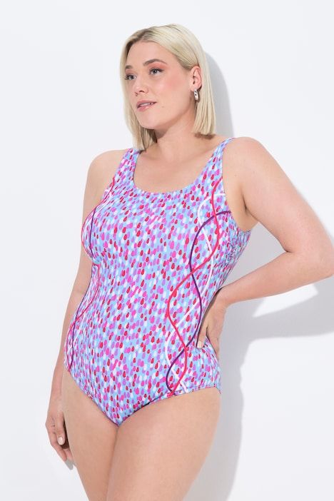 Maillot de bain à pois. Sans bonnets souples. Passepoils fantaisie. Décolleté rond