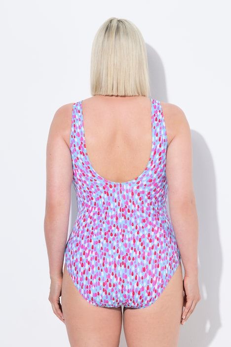 Maillot de bain à pois. Sans bonnets souples. Passepoils fantaisie. Décolleté rond