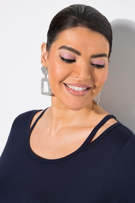 T-shirt à découpes. Encolure ronde et manches courtes. Coupe Classic