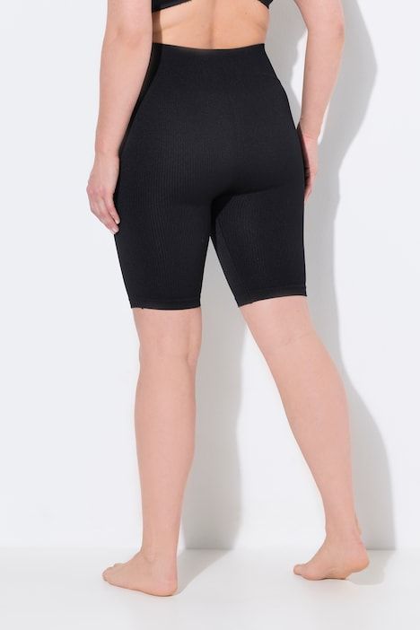 Panty en jersey côtelé. Large bande à la taille. Sans couture extérieure