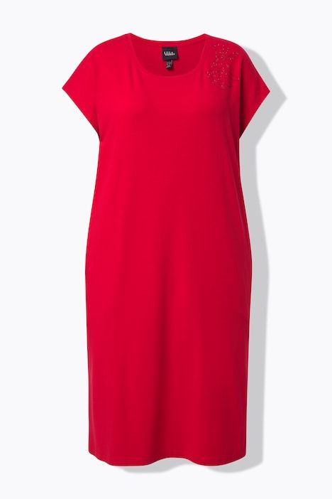 Robe oversize en jersey. Décolleté rond et manches courtes. Pierres fantaisie