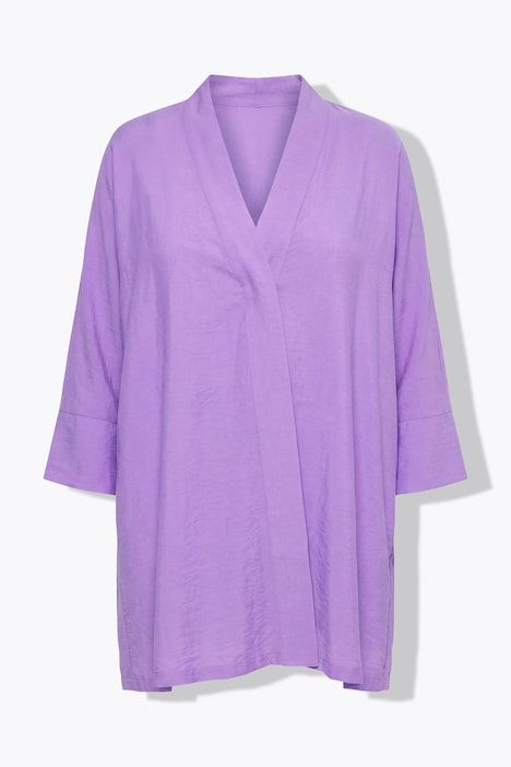 Veste à bouton-pression. Décolleté V et manches 7/8