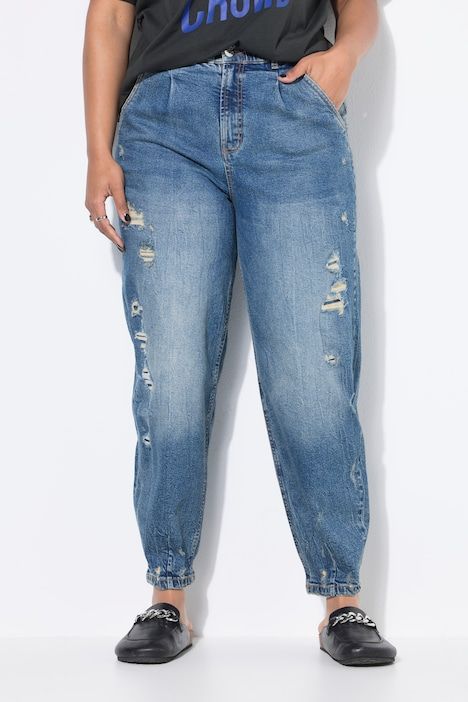 Jean ballon 5 poches. Coupe taille haute. Effets destroy