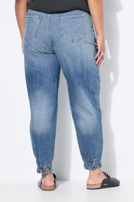 Jean ballon 5 poches. Coupe taille haute. Effets destroy