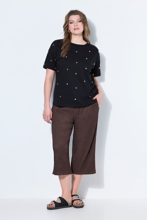 T-shirt oversize, clous cœurs