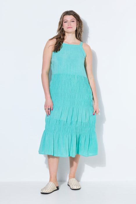 Robe midi évasée sans manches, poitrine smockée