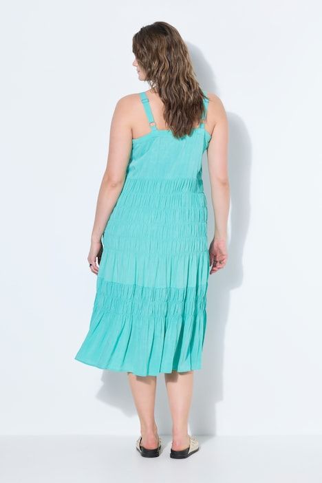 Robe midi évasée sans manches, poitrine smockée