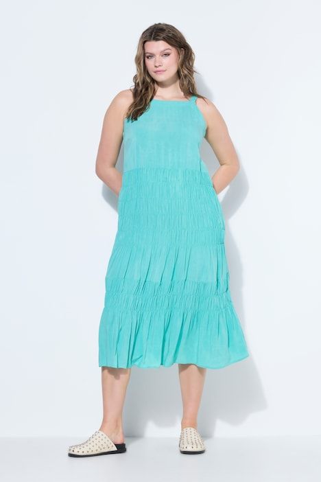 Robe midi évasée sans manches, poitrine smockée