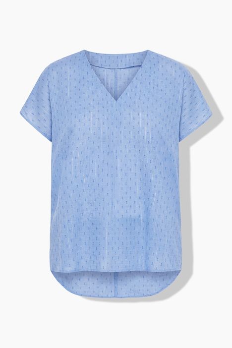 Blouse oversize, texture et paillettes