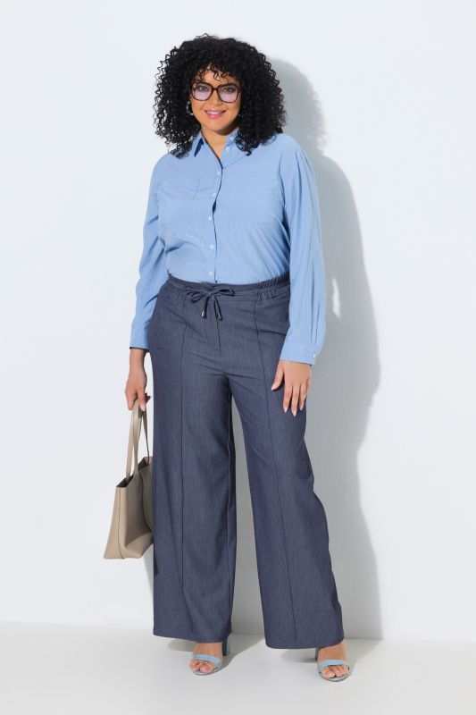 Pantalon aspect jean, taille élastique et jambe droite avec passepoil