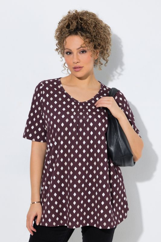 T-shirt avec passepoils, décolleté en V et manches courtes, coupe évasée