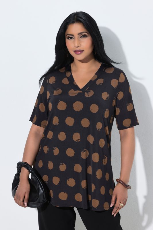 T-shirt au tombé fluide, motif à pois, décolleté en V et manches courtes, coupe évasée