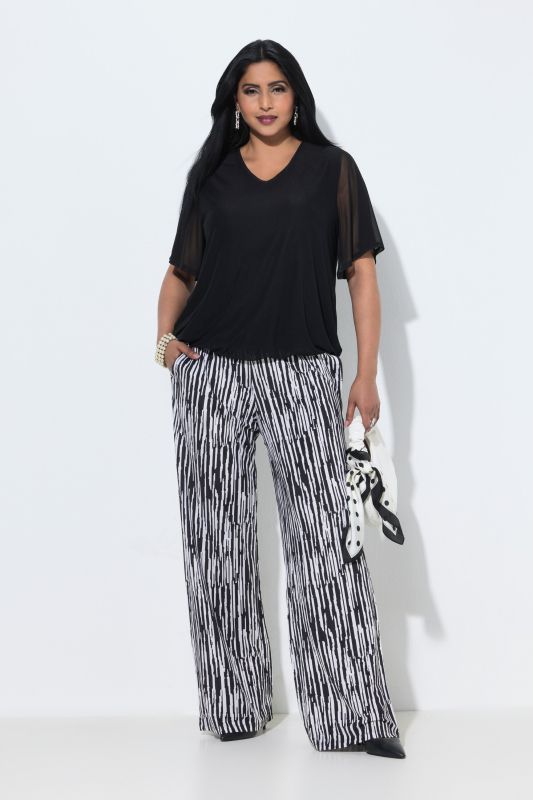 Pantalon au tombé fluide, motif à rayures, jambe large et taille élastique