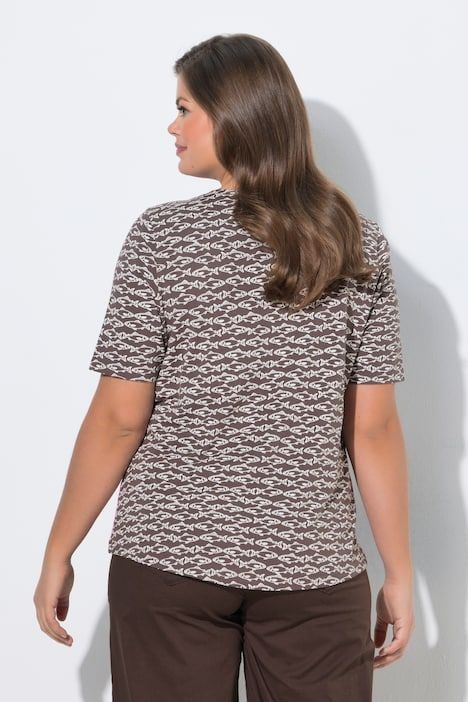 T-shirt à col rond et manches courtes. Imprimé sur toute la surface et label OEKO-TEX